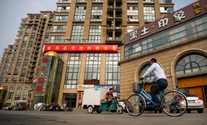 Lawyers at Beijing's Feng Rui Law Firm (right) have been detained by China's government. (AP Photo/Mark Schiefelbein).